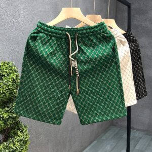 Celine all-over print shorts green