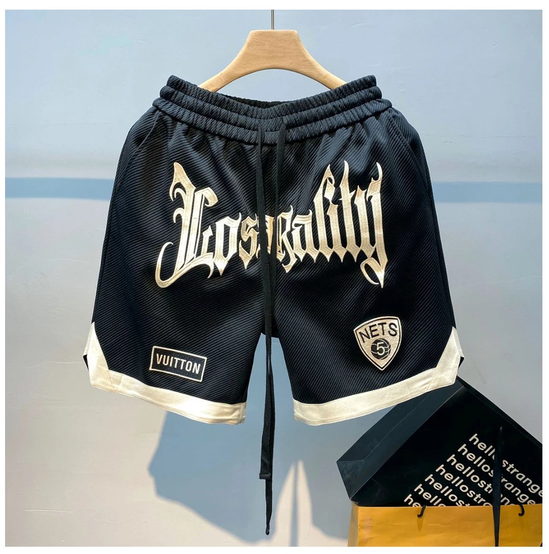 Louis Vuitton black shorts in everyday casual style - Image 2
