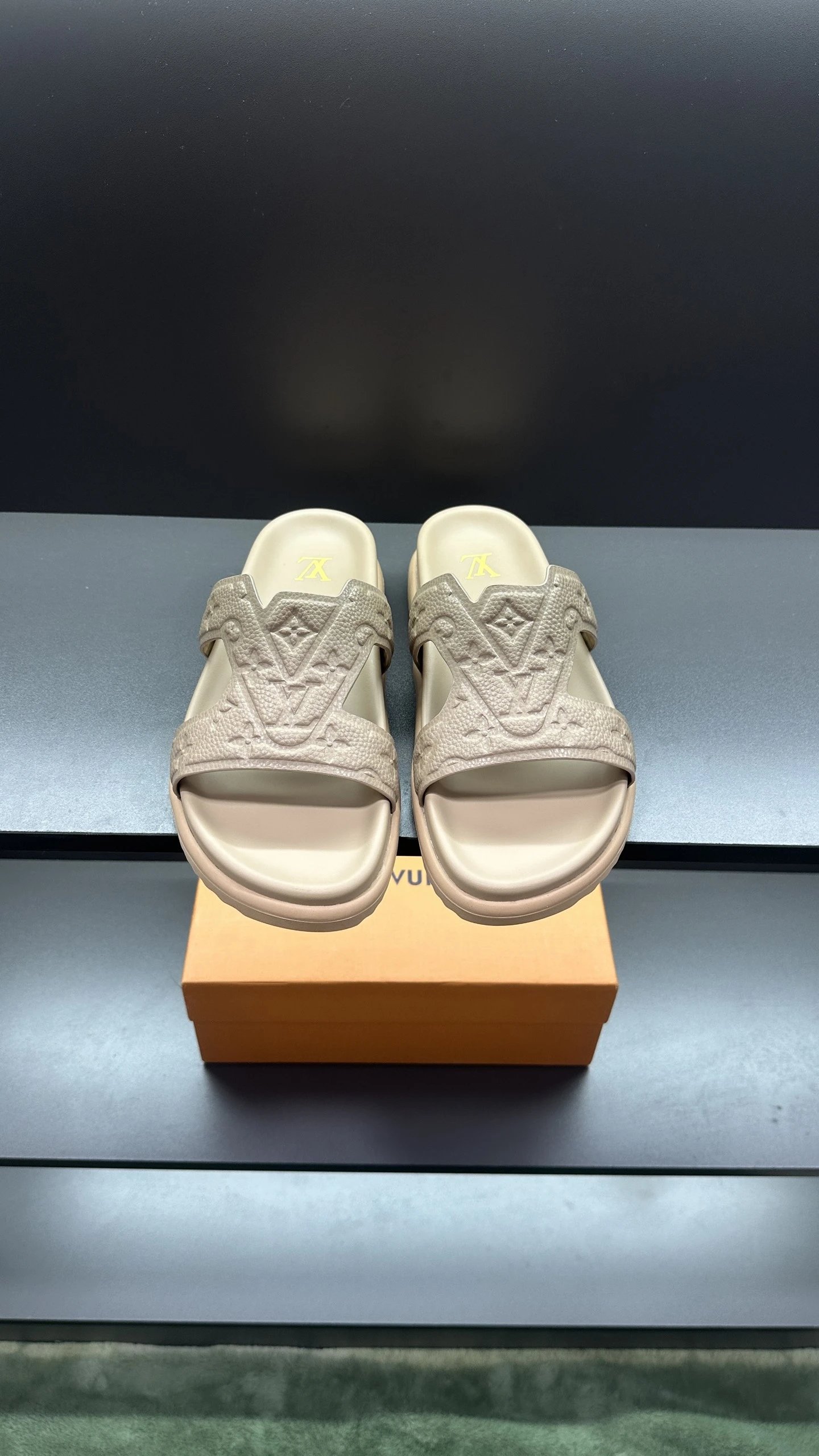 Louis Vuitton slides gold