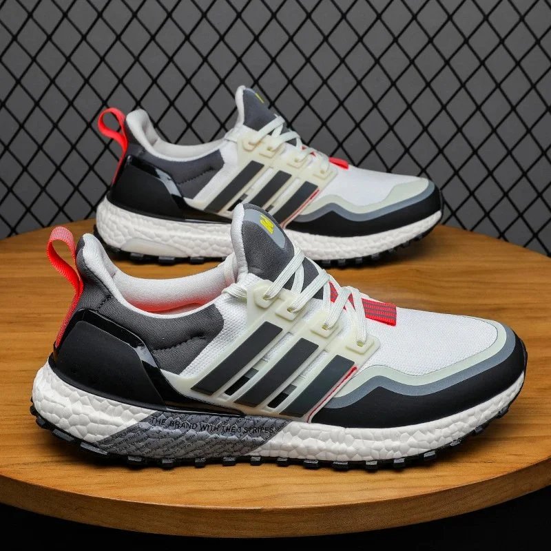 Adidas black sneakers in classic athletic style - Image 10