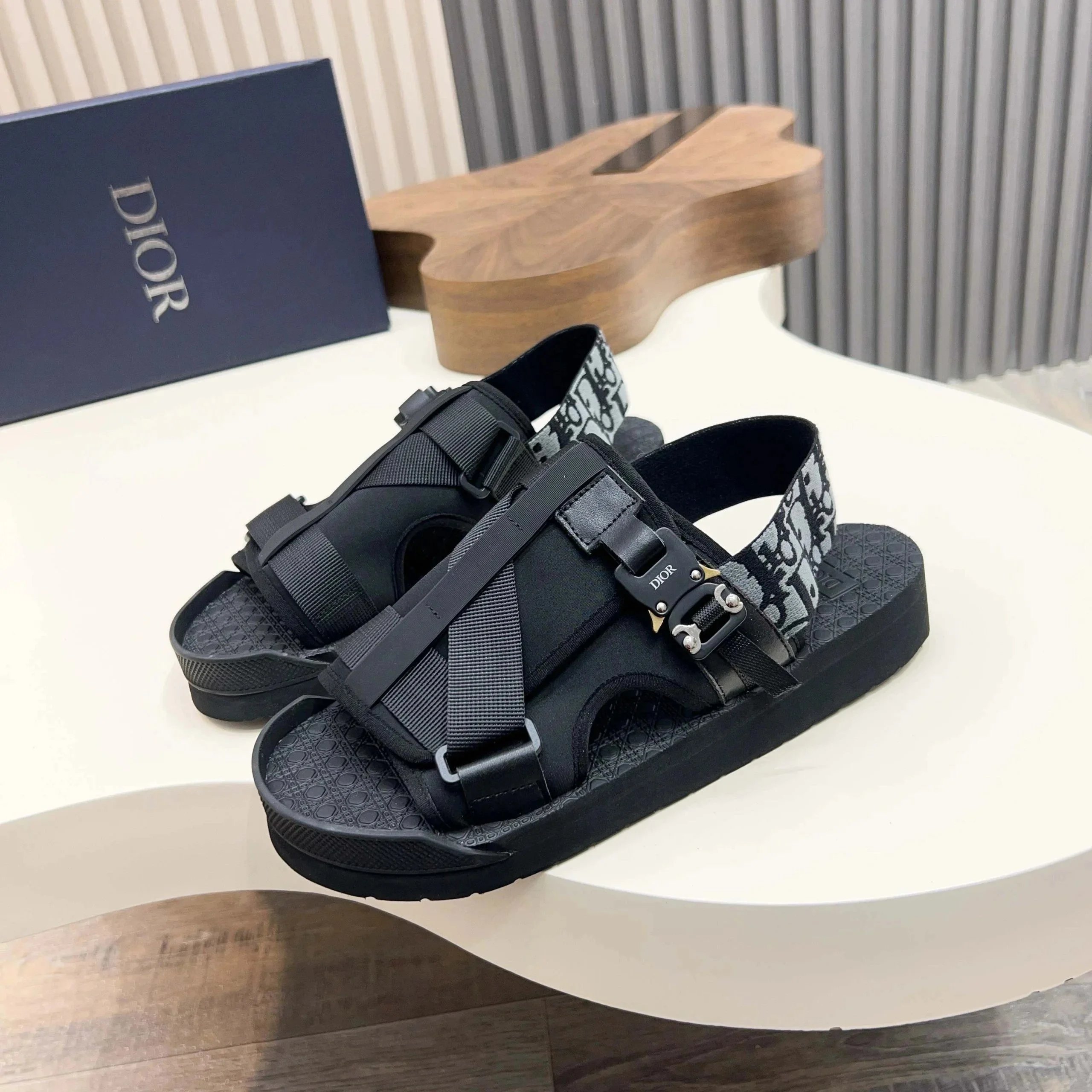 Dior black slides in easygoing casual style - Image 3