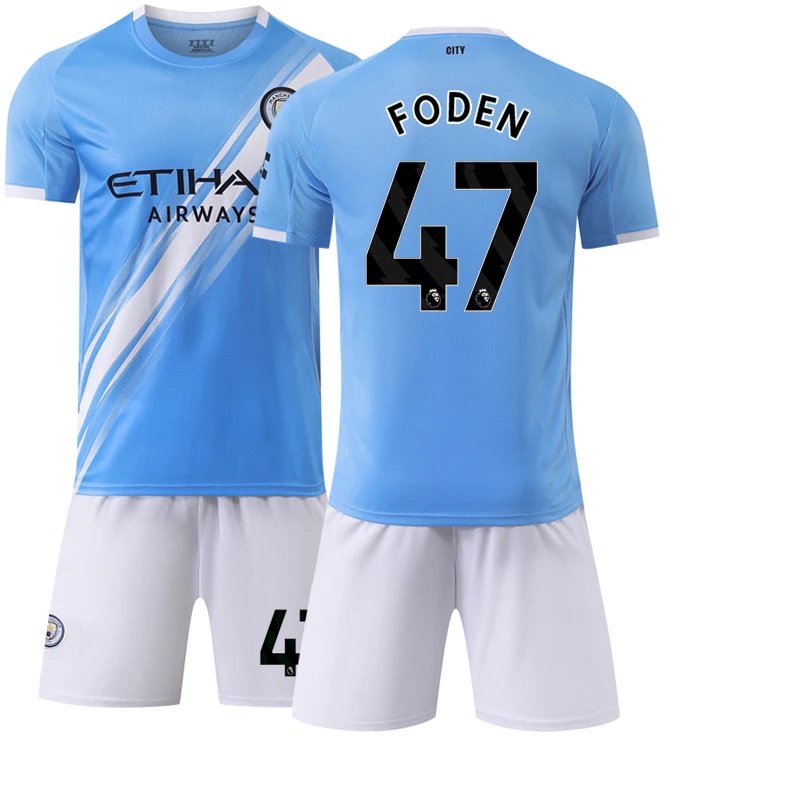 Manchester City blue football jersey in retro sports style - Image 23