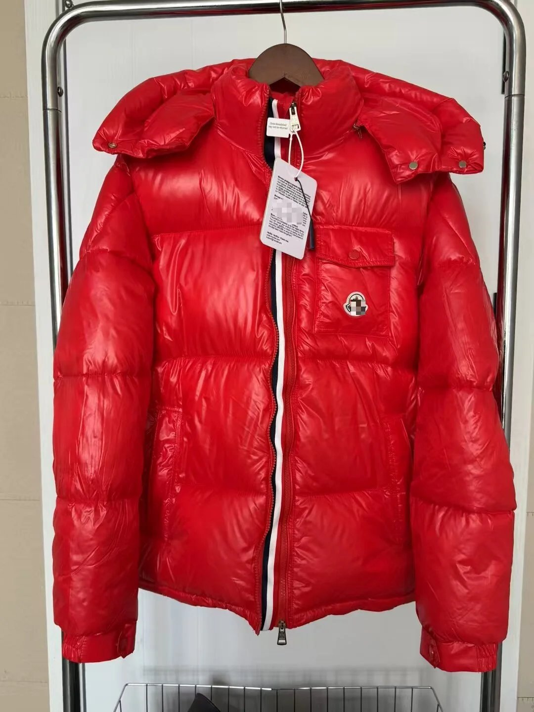 Moncler navy puffer jacket in cold-weather street style - Image 3
