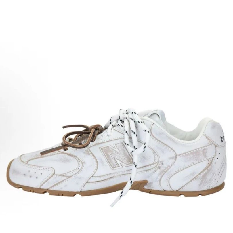 New Balance white sneakers in classic athletic style - Image 4