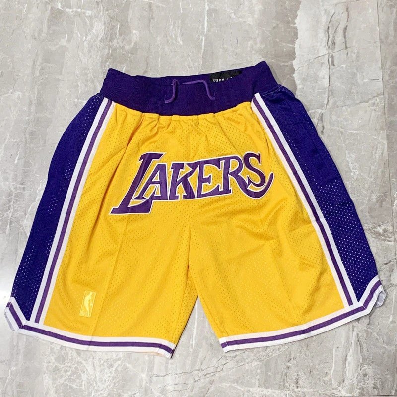 Utah Jazz purple basketball jersey in retro sports style - Image 2